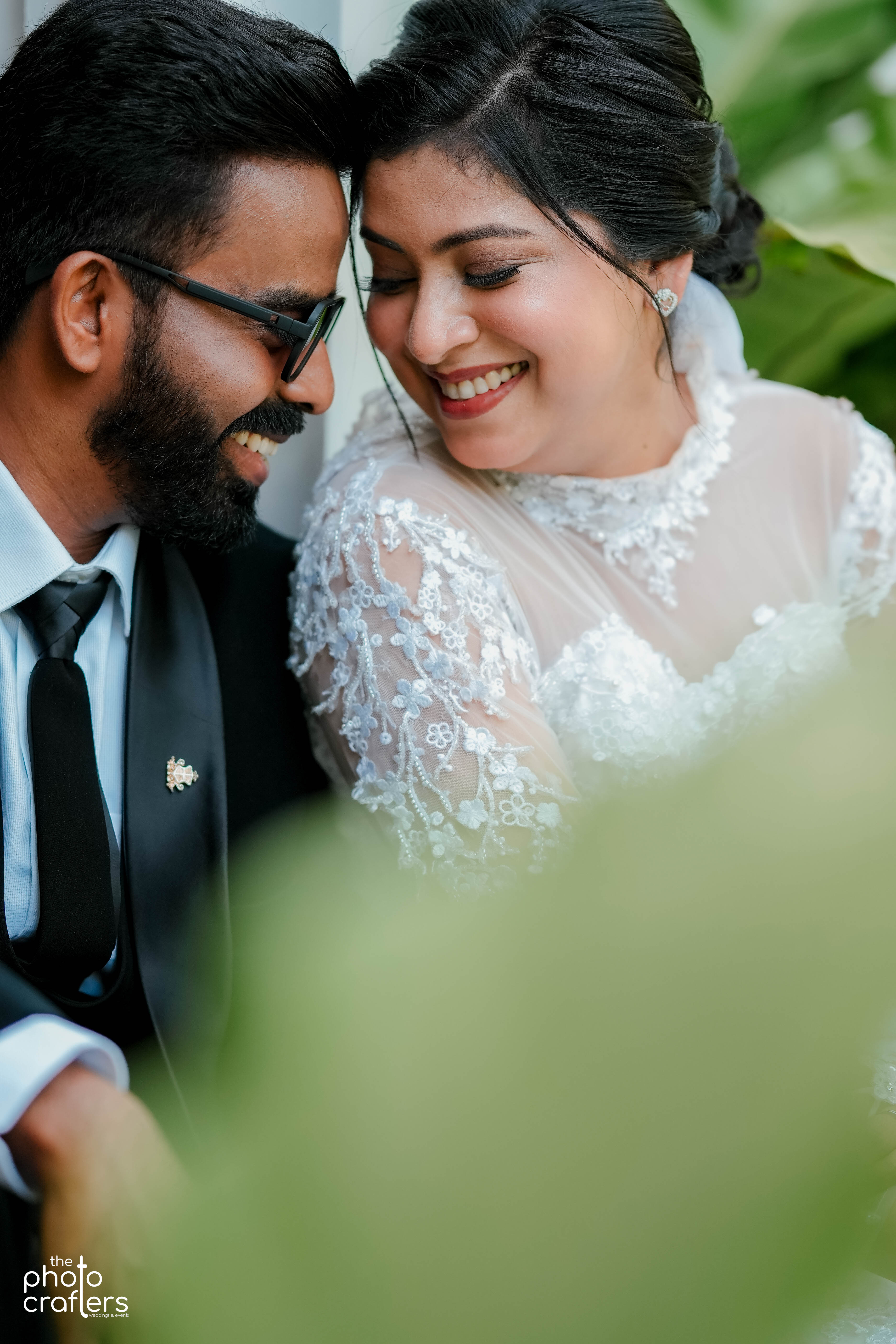 Candid Smile of Bride during Groom Ring Exchange - The Photocrafters