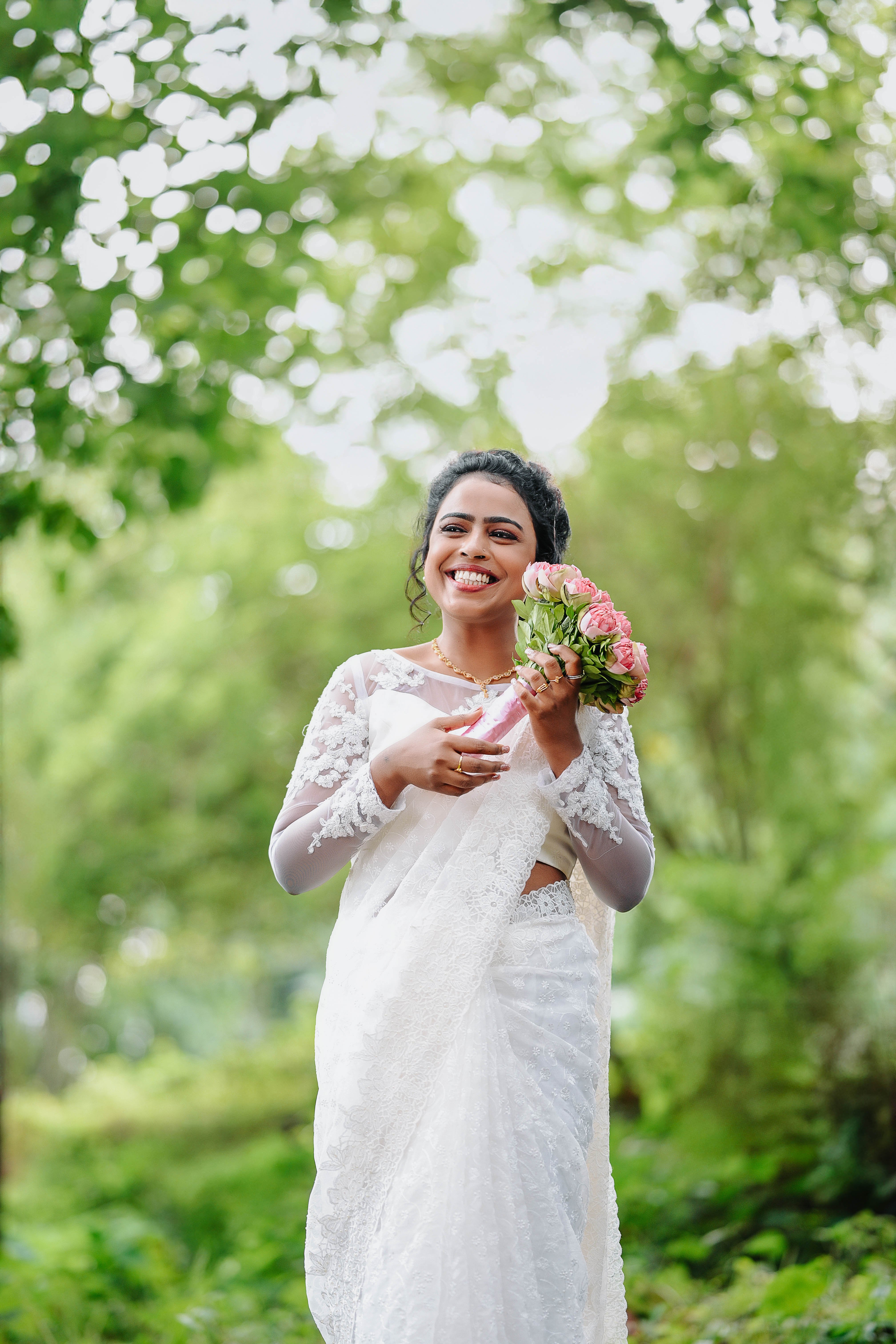Candid laughter of bride and groom during vows - The Photocrafters